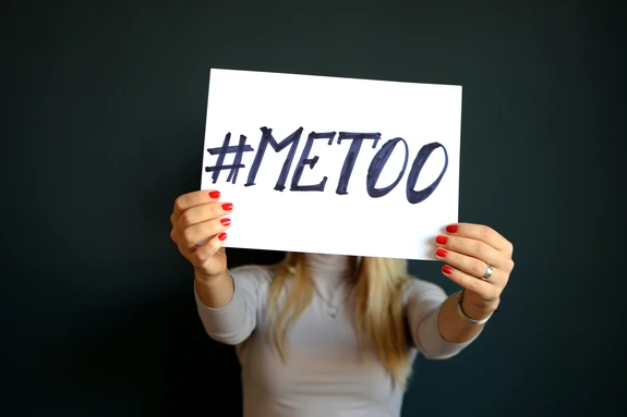 woman holding metoo sign