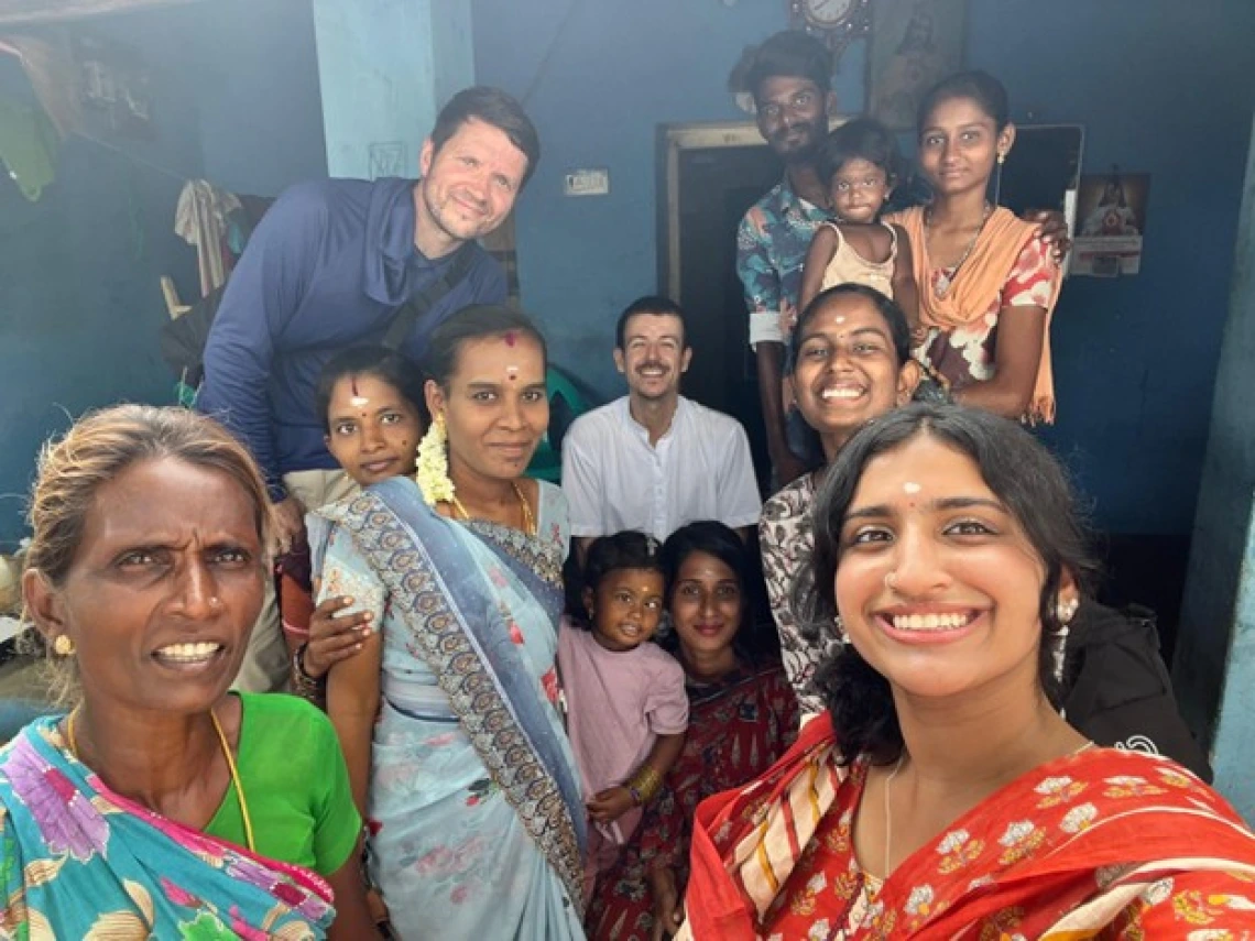 Aaron Womack and Anusha Sharma with host family