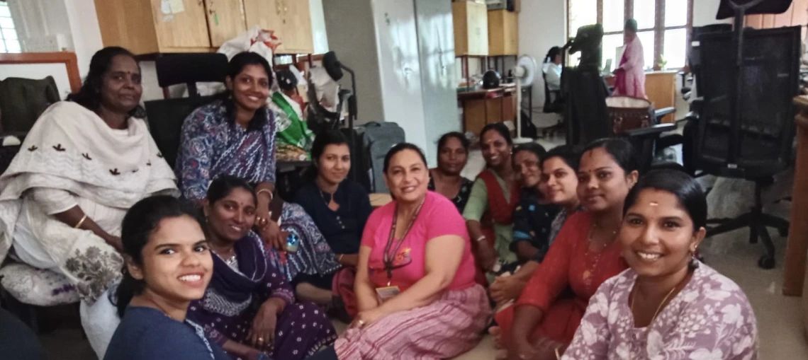 Beatriz Winters with members of the Sivasakthi Tailoring Unit