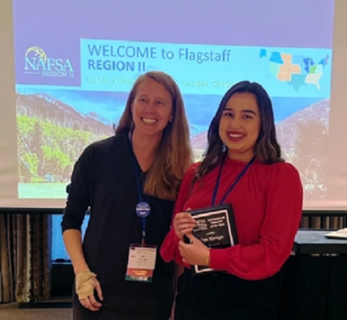 Hope Noriega received award from Laura Pfaff Hope Noriega received award from Laura Pfaff