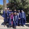 Some 2025 graduates with faculty members after the convocation ceremony.