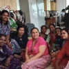 Beatriz Winters with members of the Sivasakthi Tailoring Unit